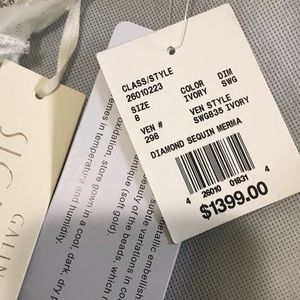Brand New Wedding Dress, Never Worn. Tags Still Attached. Color Ivory. Size 8.